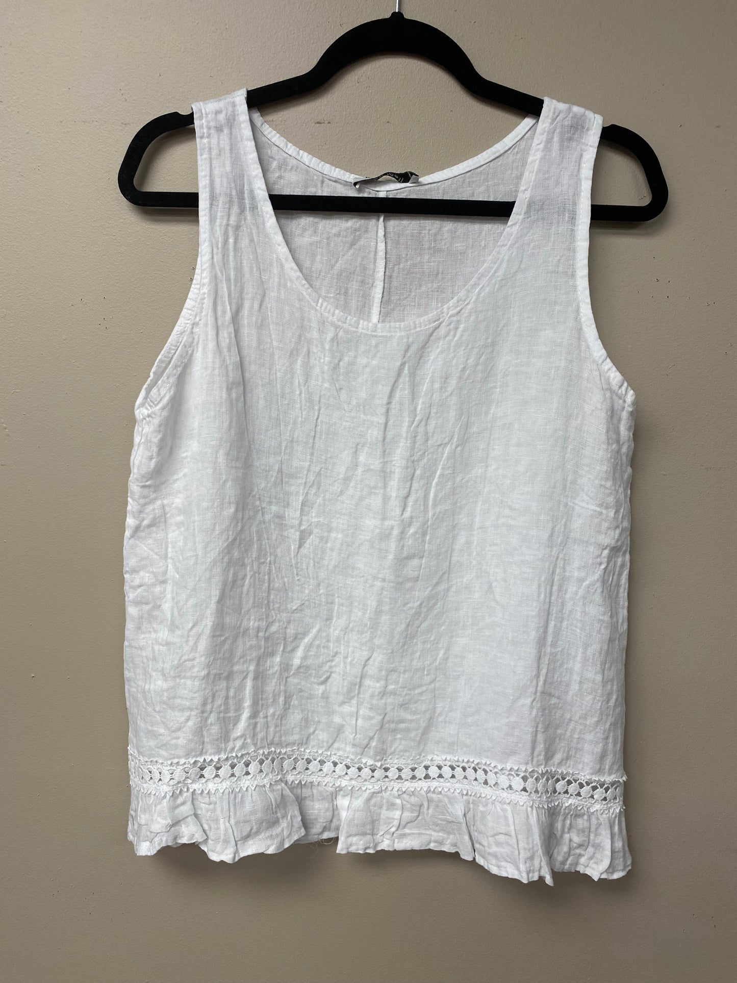 Italian linen with crocheted ribbon and ruffled hem.