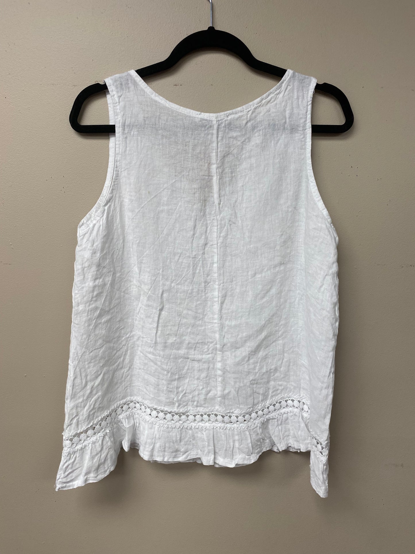 Italian linen with crocheted ribbon and ruffled hem.
