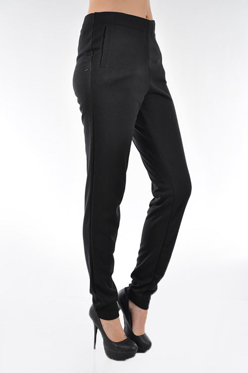 Skinny leg knit trouser with a side zipper.