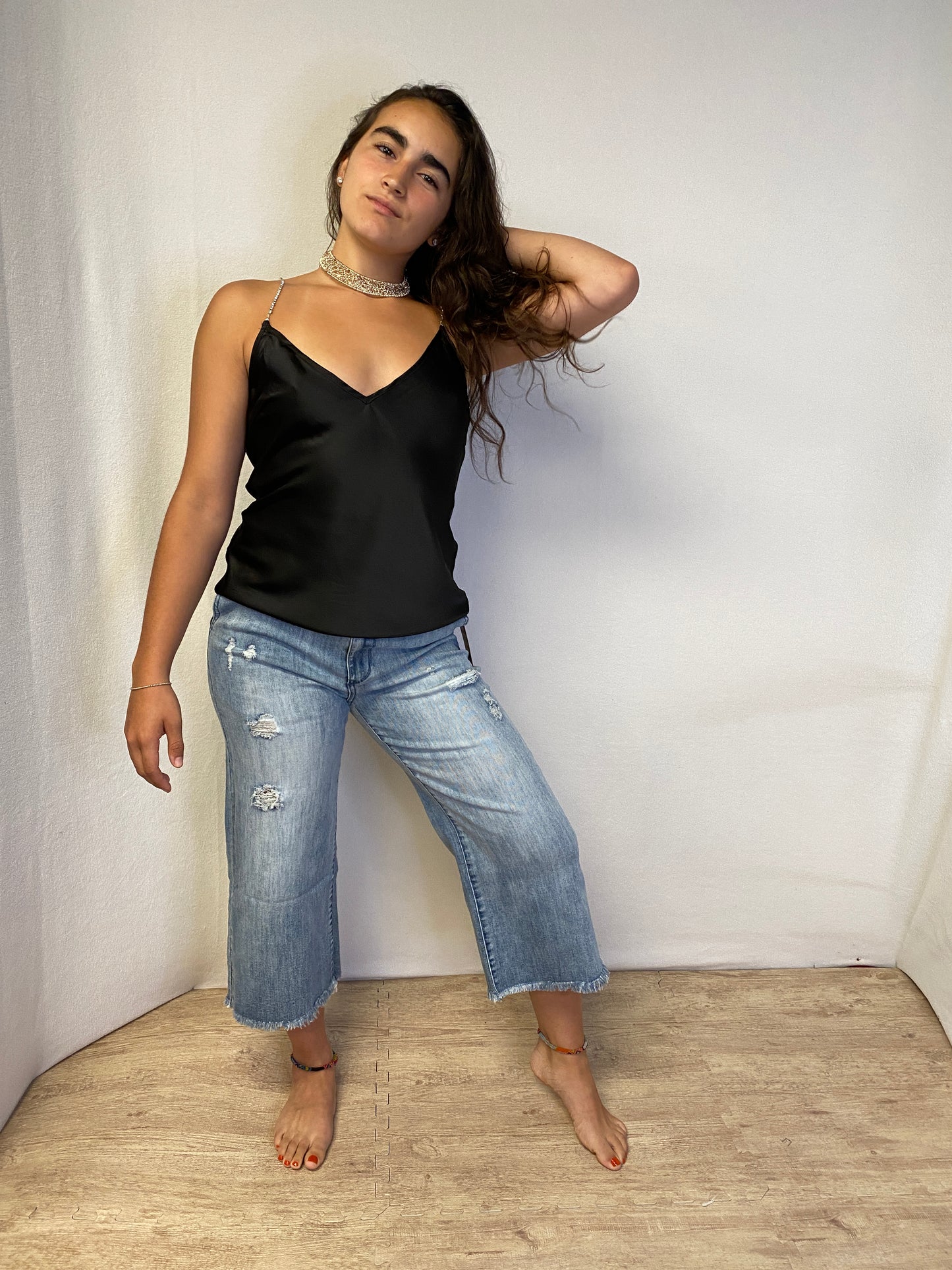 Silky Cami with Rhinestone straps detail.