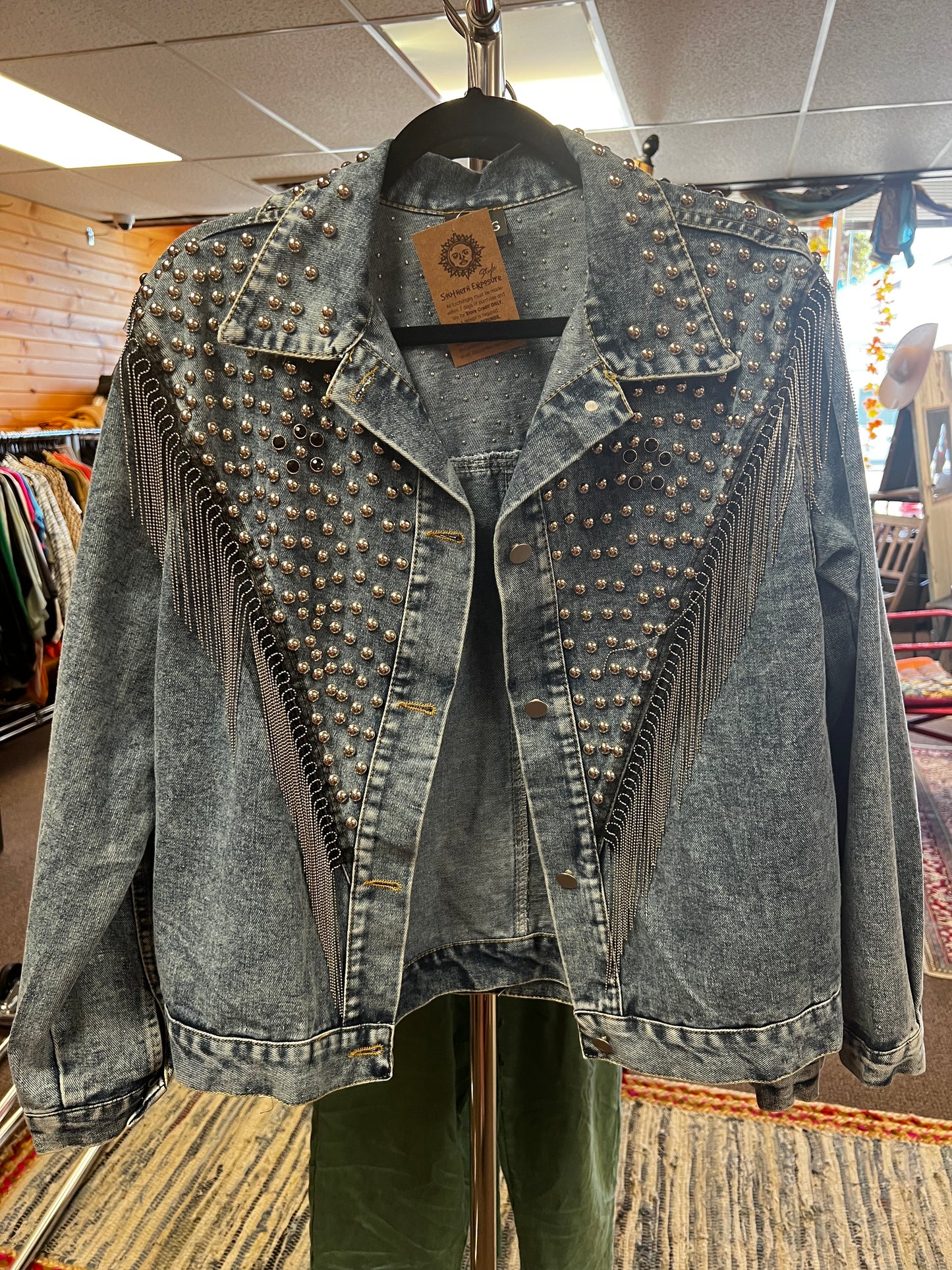 Fringe studded denim jacket.