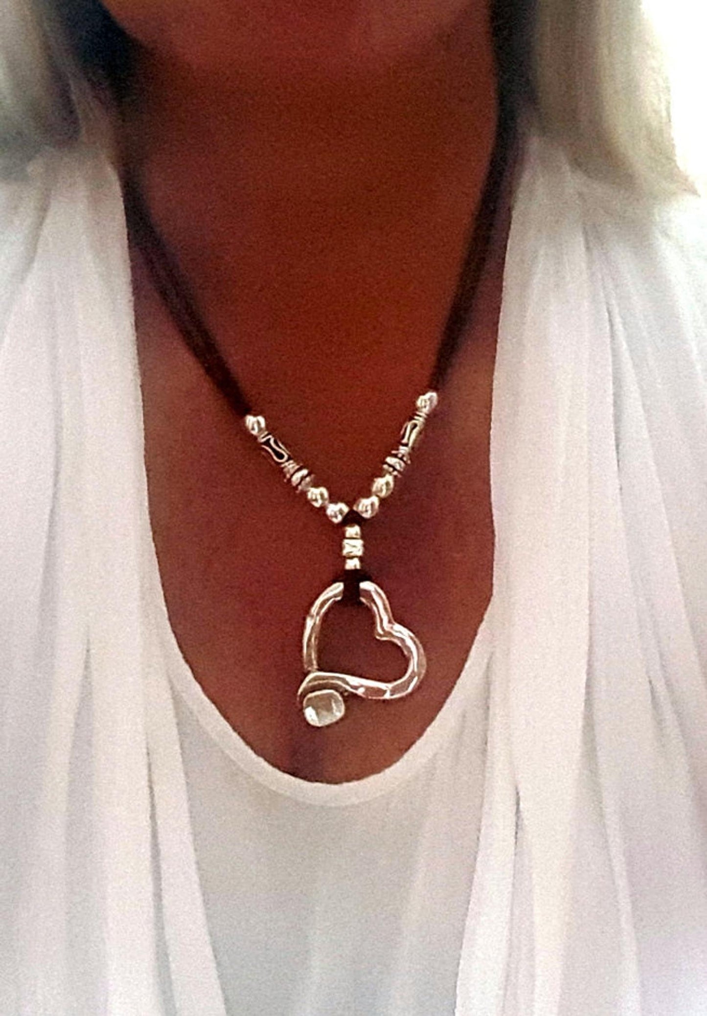 Beaded heart leather necklace.