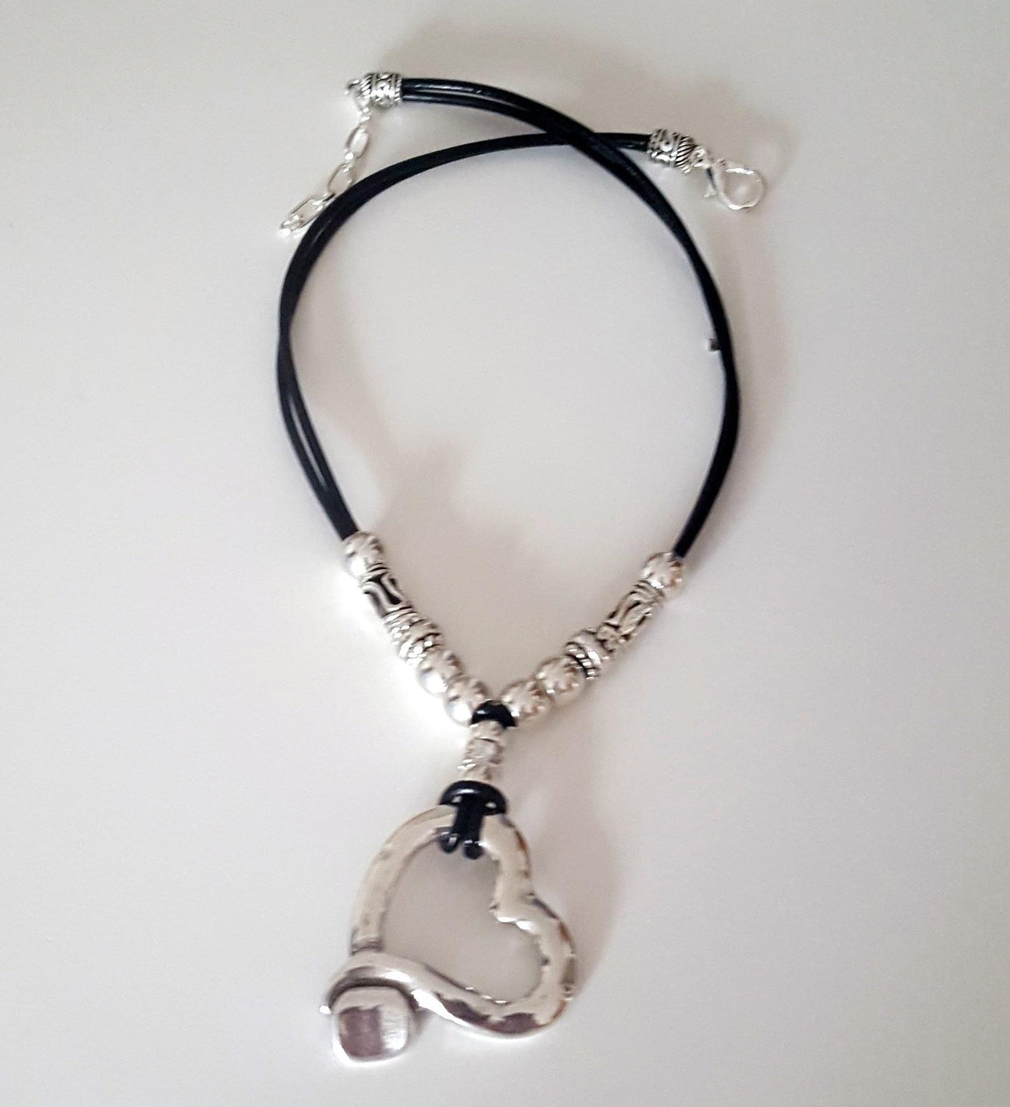 Beaded heart leather necklace.