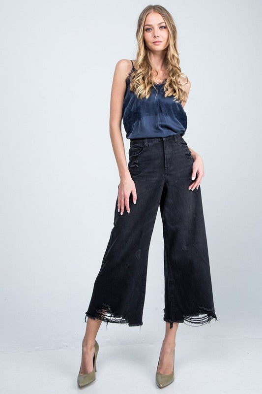 High Rise Super Wide Jean with distressed hem.