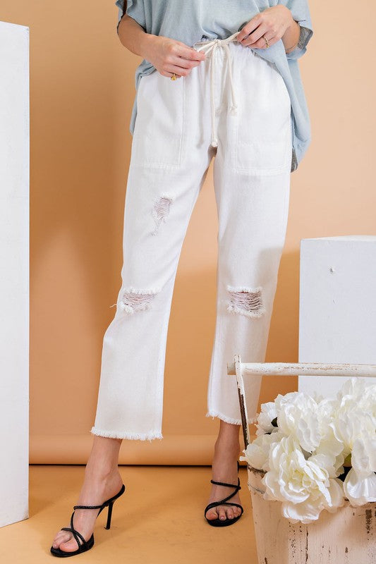 Ripped and distressed boyfriend pants.