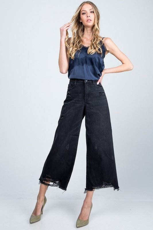 High Rise Super Wide Jean with distressed hem.