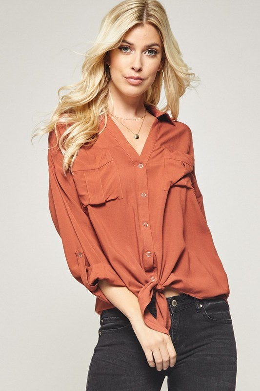 Button down shirt top in solid with knot tie on front.