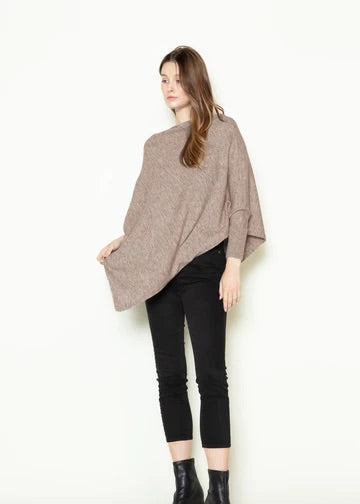 Triangle Poncho with sleeves.