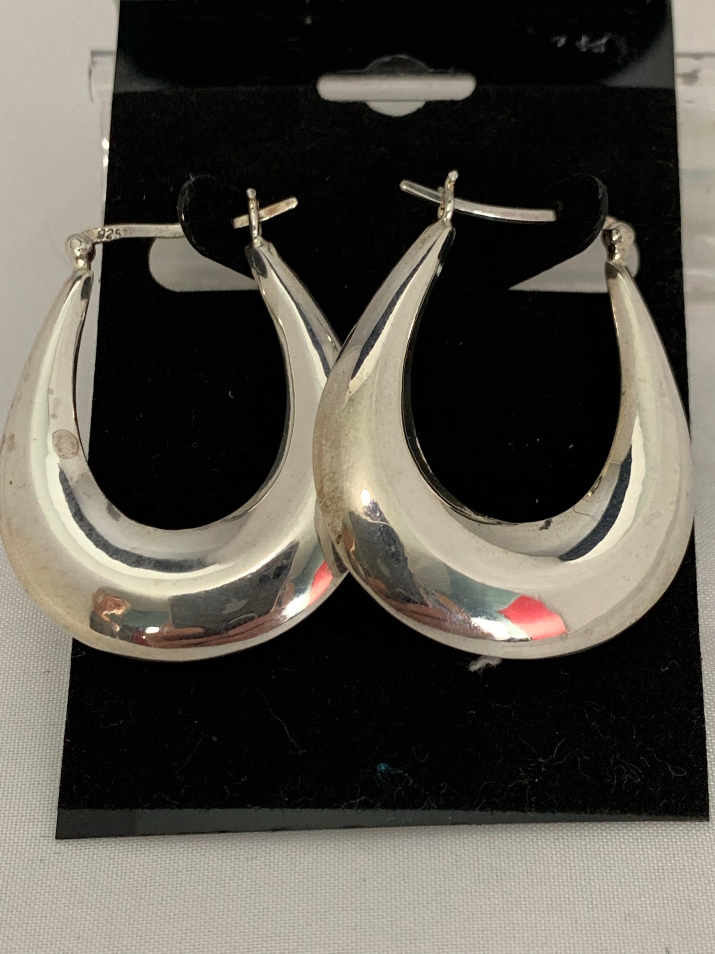 Sterling silver oval hoop earrings