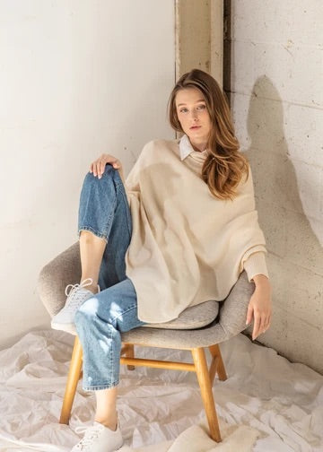 Triangle Poncho with sleeves.