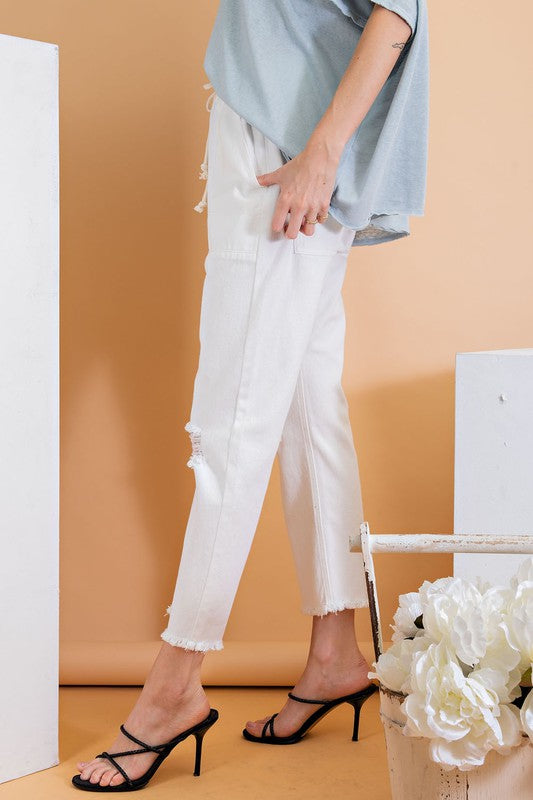 Ripped and distressed boyfriend pants.