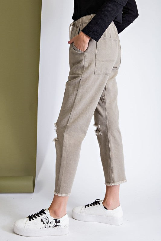 Ripped and distressed boyfriend pants.