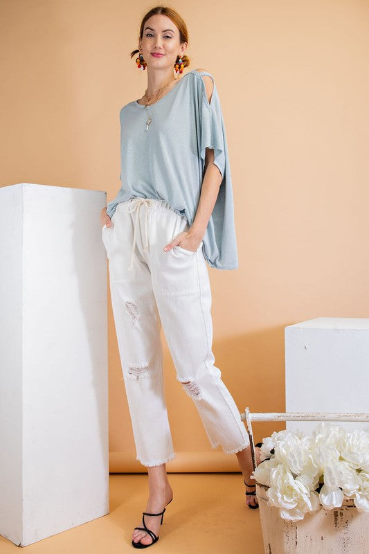 Ripped and distressed boyfriend pants.
