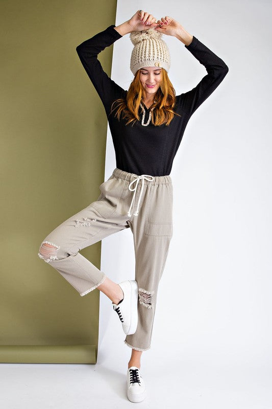 Ripped and distressed boyfriend pants.