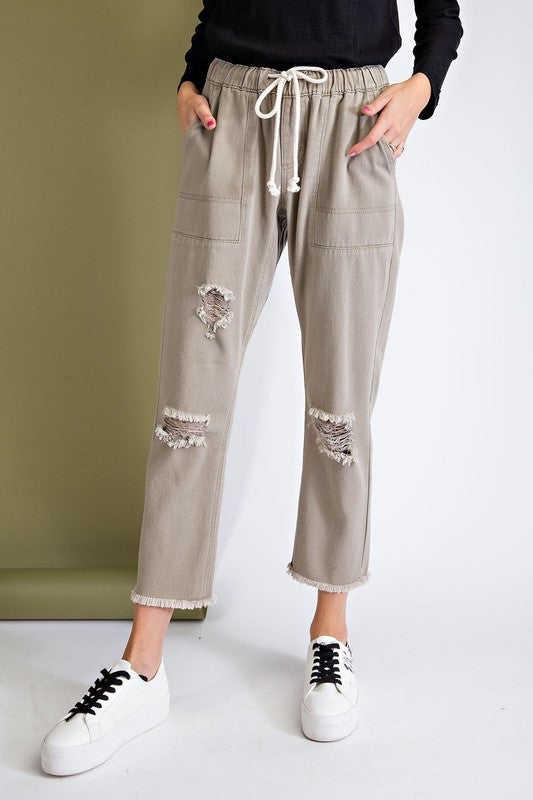 Ripped and distressed boyfriend pants.