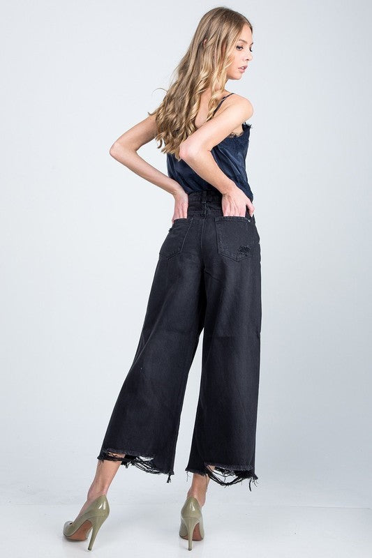 High Rise Super Wide Jean with distressed hem.