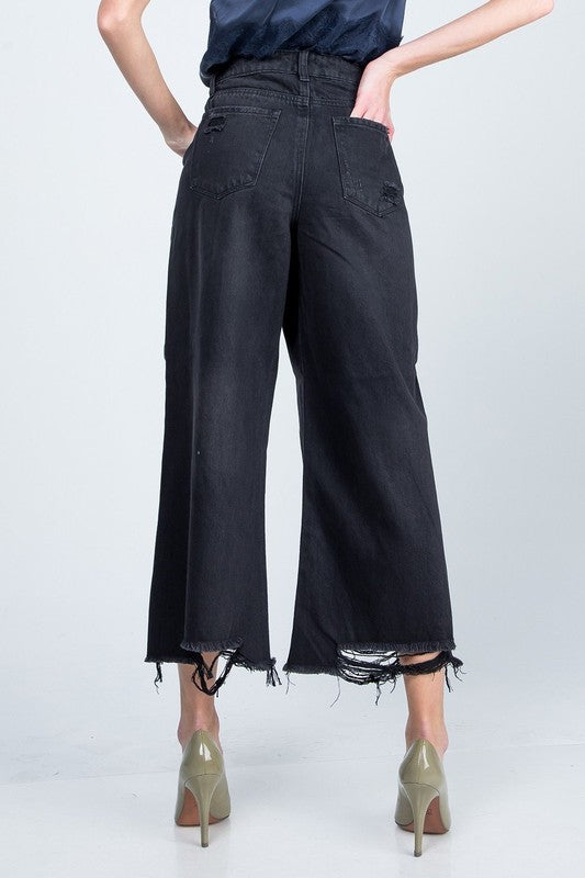 High Rise Super Wide Jean with distressed hem.