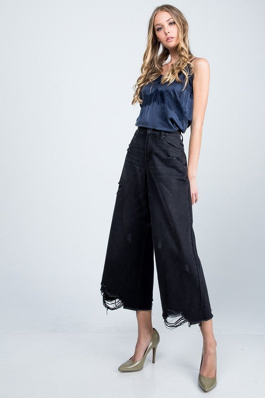 High Rise Super Wide Jean with distressed hem.