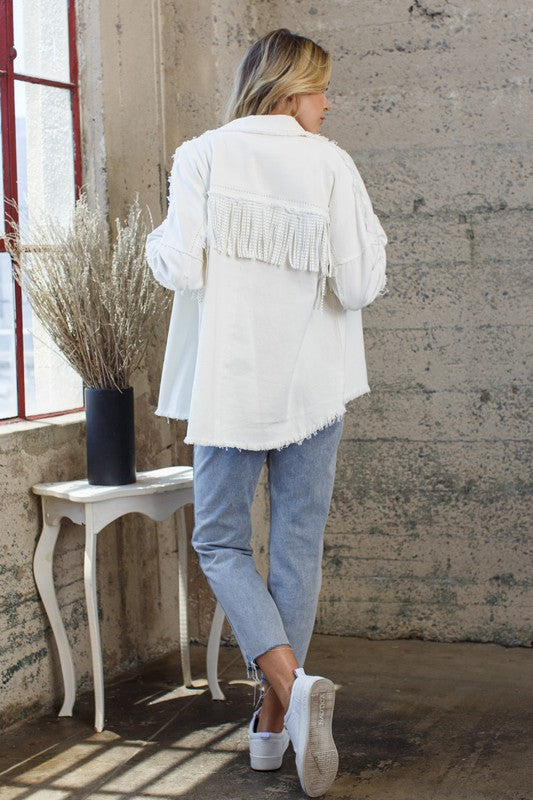 Fringe Shacket with frayed detail.