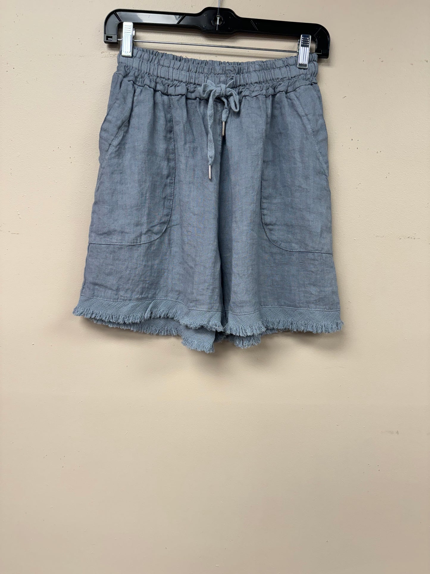 Italian linen distressed hem shorts.