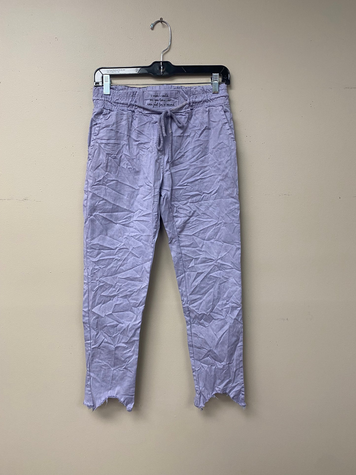 Distressed hem, Italian drawstring joggers.