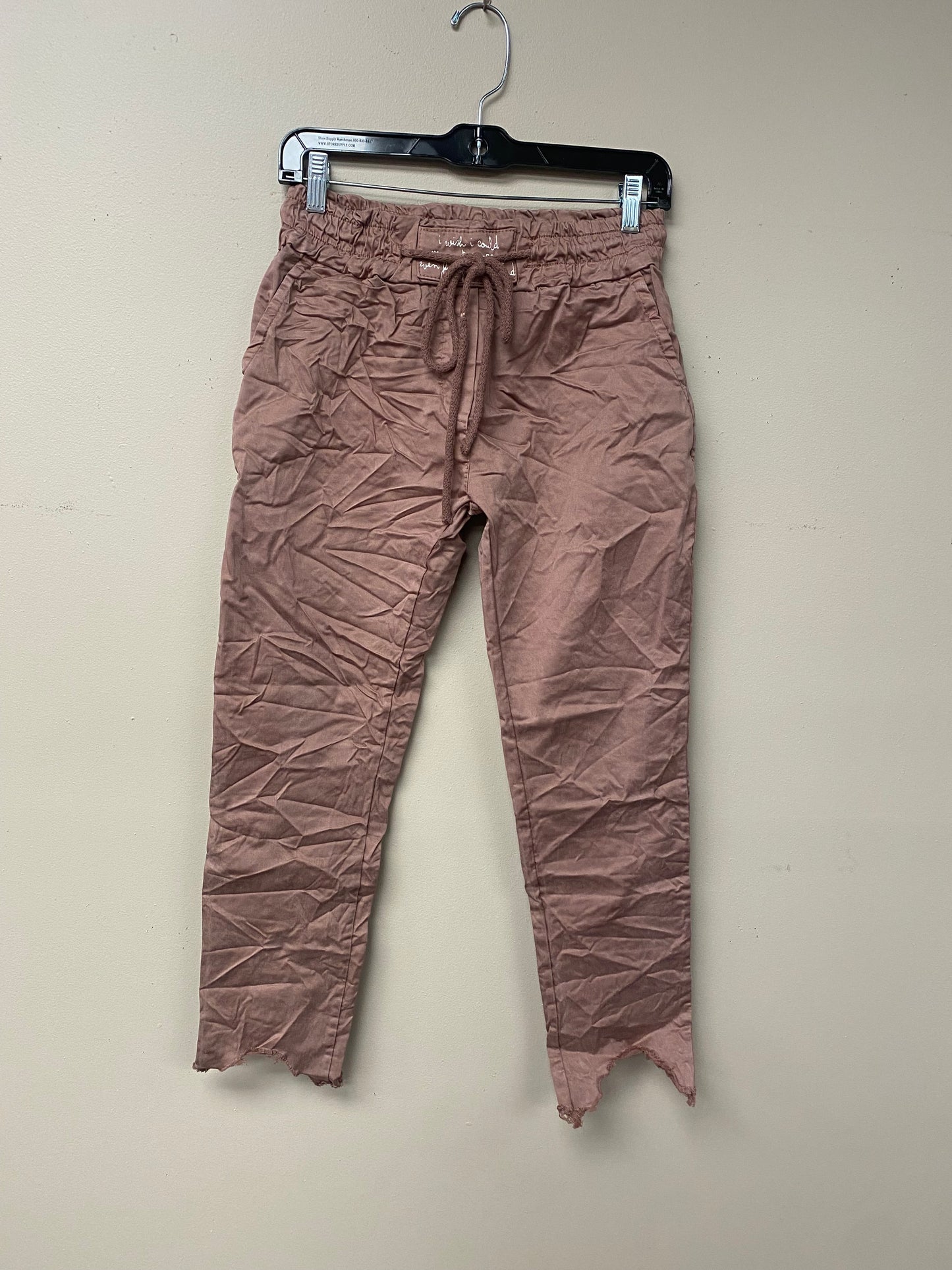 Distressed hem, Italian drawstring joggers.