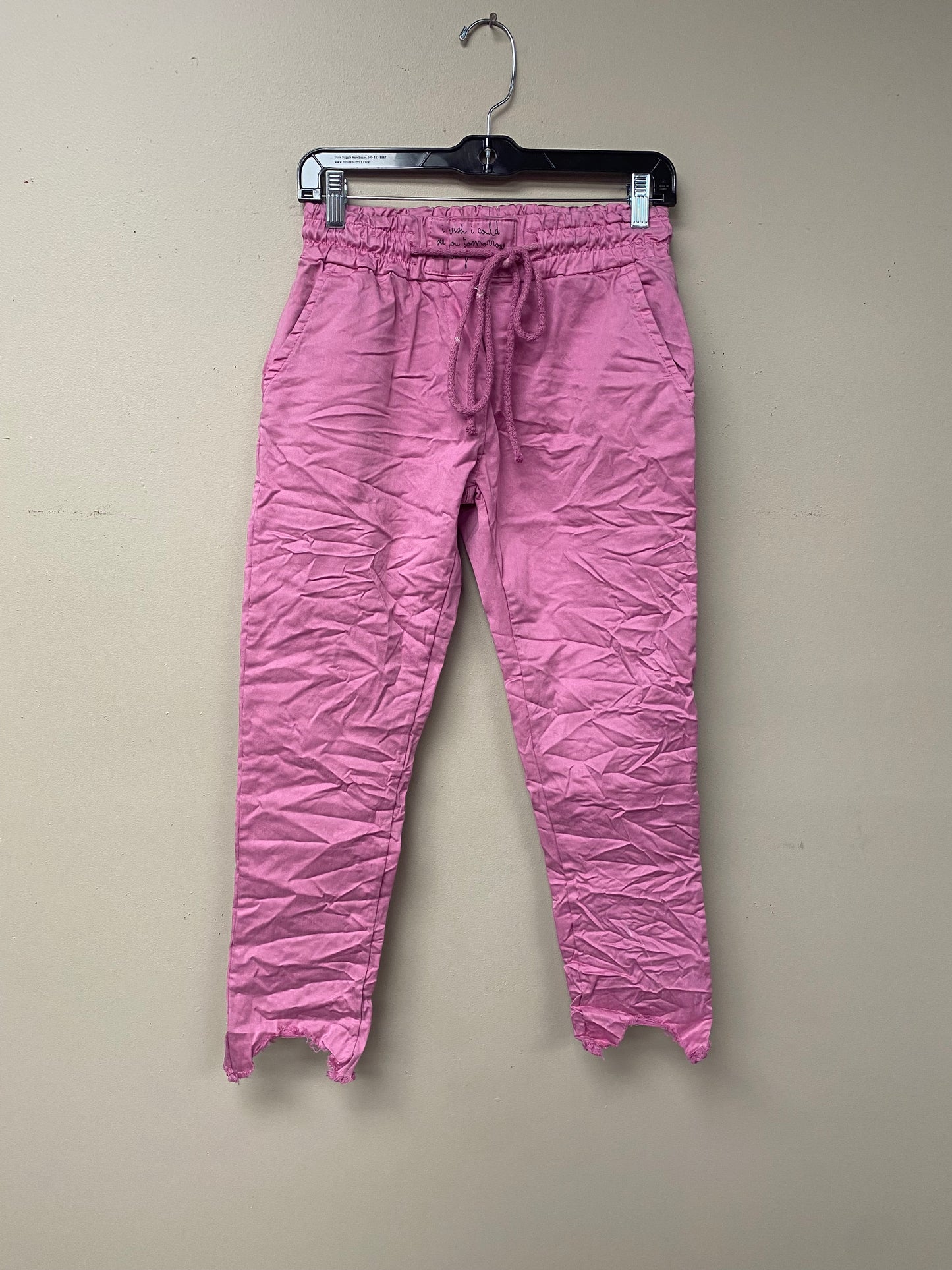 Distressed hem, Italian drawstring joggers.