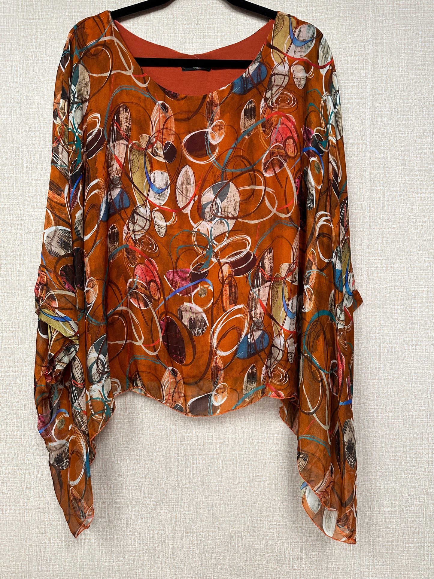 Italian circles print caftan top.