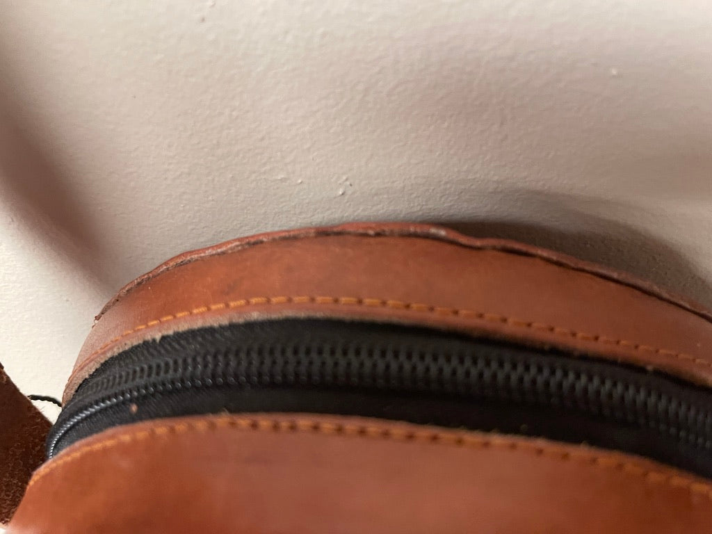 #2  Small Round Leather Bag.