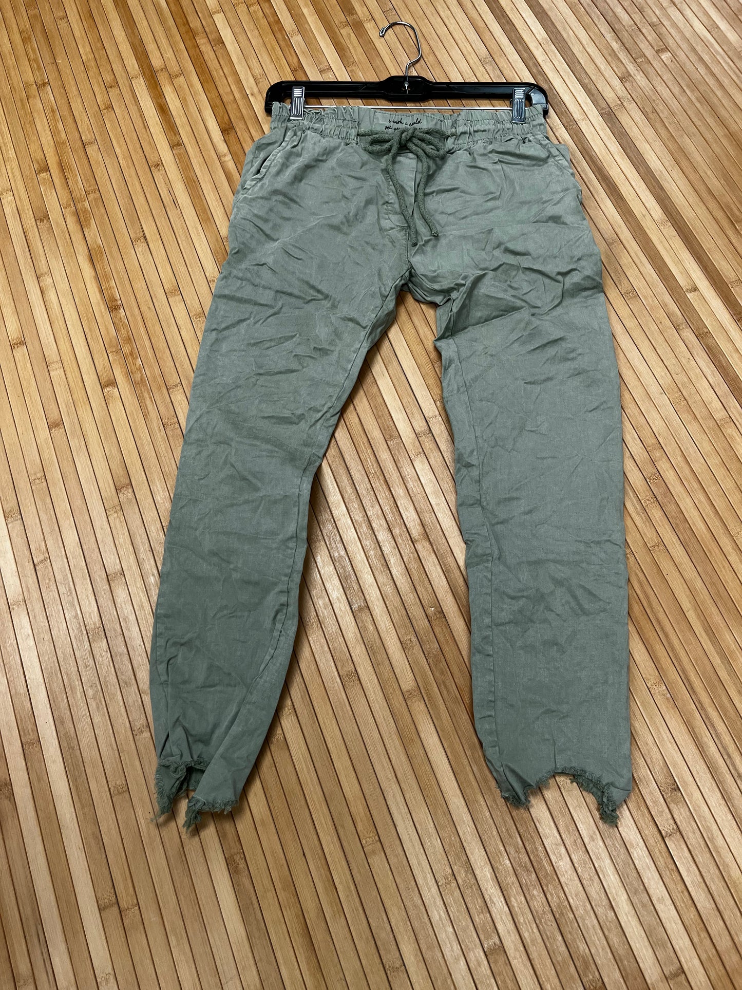 Distressed hem, Italian drawstring joggers.