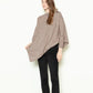 Triangle Poncho with sleeves.
