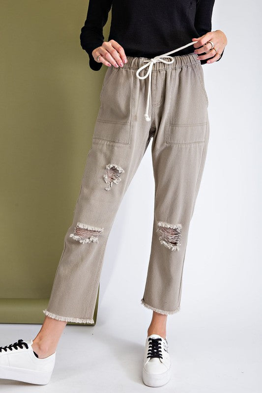 Ripped and distressed boyfriend pants.